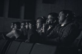 Image of student audience members at a film screening