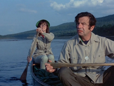 Elaine May and Walter Matthau paddling in a rowboat, in a scene from A NEW LEAF (1971)